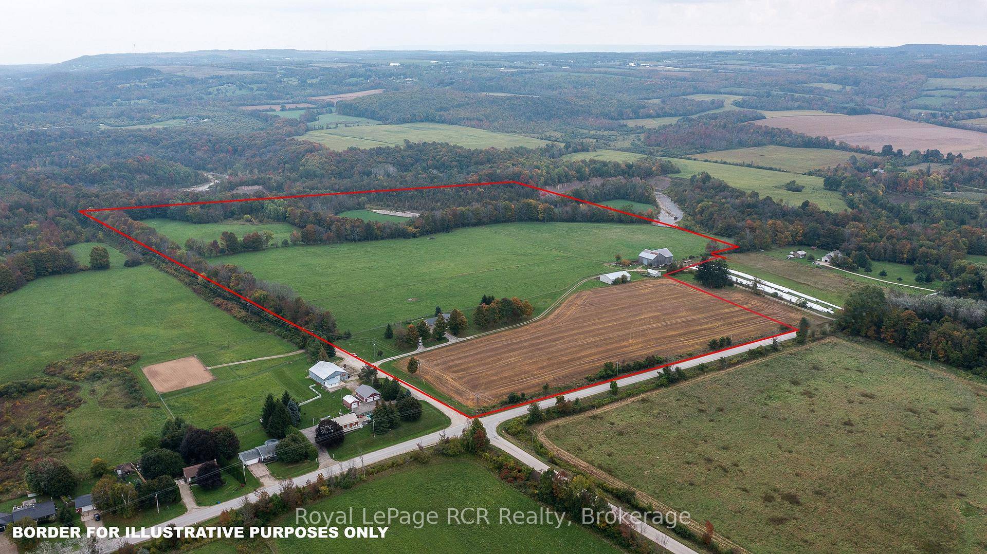 70 acre corner farm with natural gas and a full set of buildings.