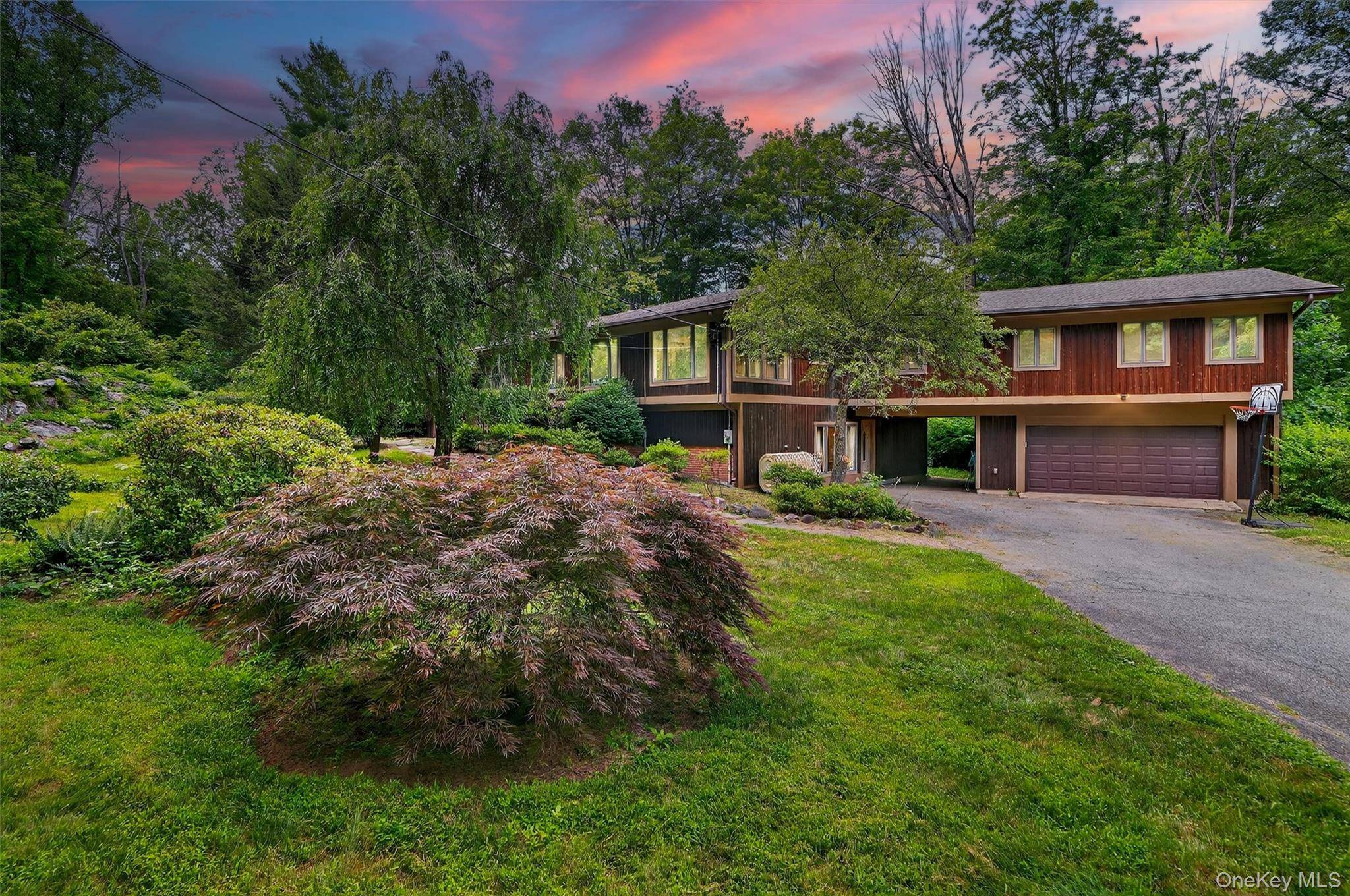 Spacious, private, and filled with possibility, this split level contemporary with four bedrooms and four baths offers nearly 5, 000 square feet of living space.