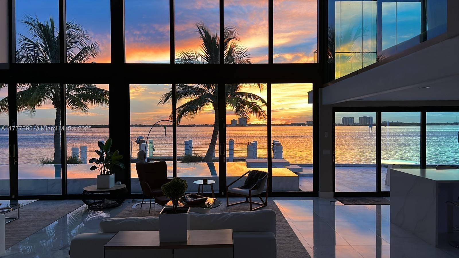 Welcome to an extraordinary waterfront retreat in the heart of the gated community of Biscayne Point Island, where stunning breathtaking wide water views capture unforgettable sunsets.
