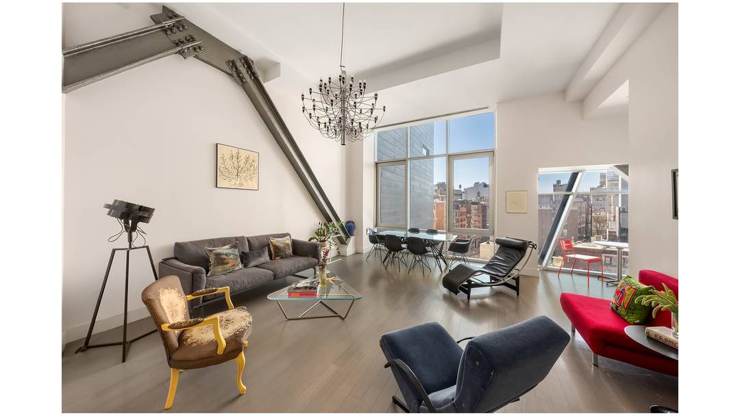 Full Floor NoHo Loft Condo with 13' Ceilings, Steel Trusses amp ; Private Elevator A private keyed elevator opens directly into this striking full floor residence, where soaring 13 foot ...