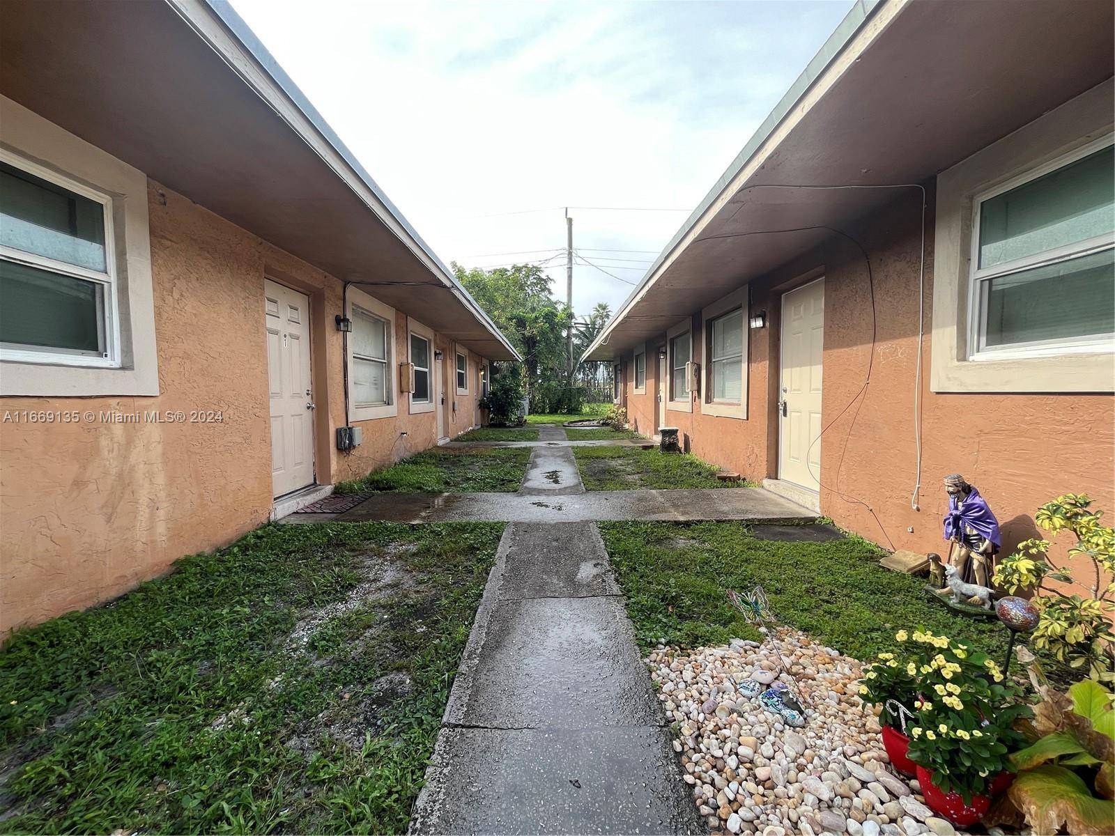 SOLD AS IS ! TRIPLEX WITH ALL 3 UNITS RENTED.