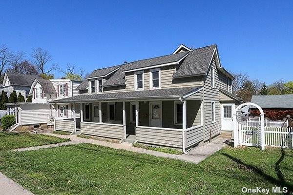 A rare, unique side by side 2 family house on an oversize grassy lot, 60 x 102, in the heart of Port Washington, great for backyard entertaining and recreation or ...