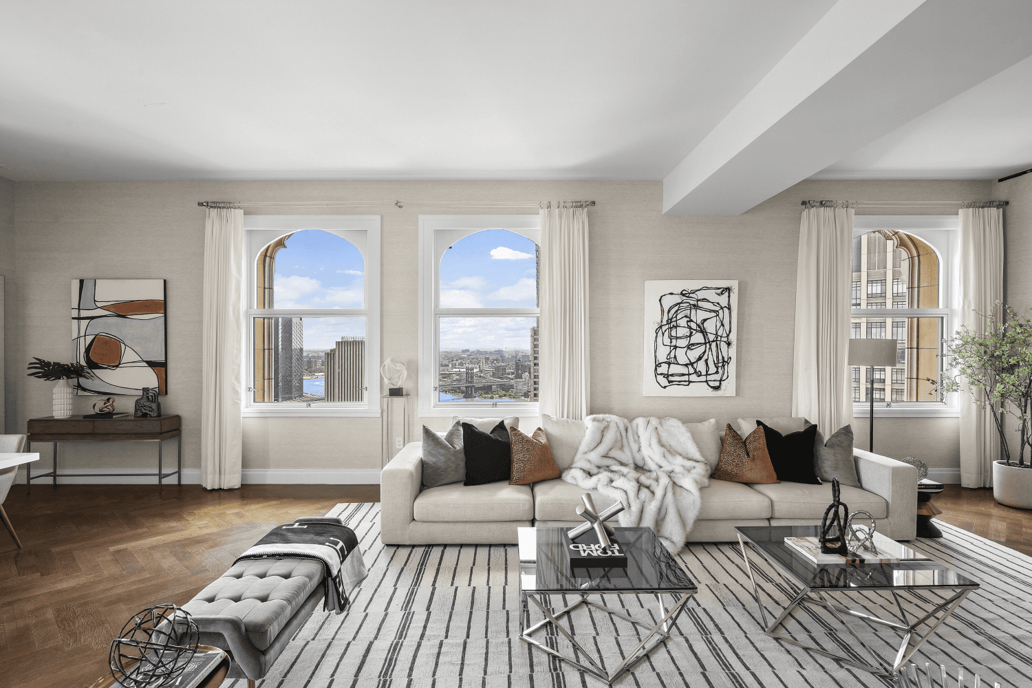 Welcome to Residence 41A at the iconic Woolworth Tower, where luxury meets grandeur and dual bridge amp ; water exposures take center stage.