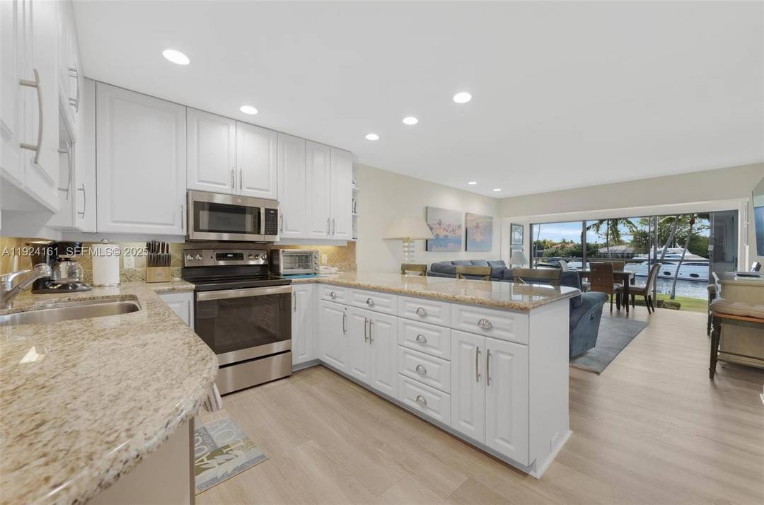This top floor 2 bedroom, 2 bathroom condo in Angelfish Cay Association 3 at Ocean Reef Club offers the perfect blend of comfort, convenience, and investment potential.