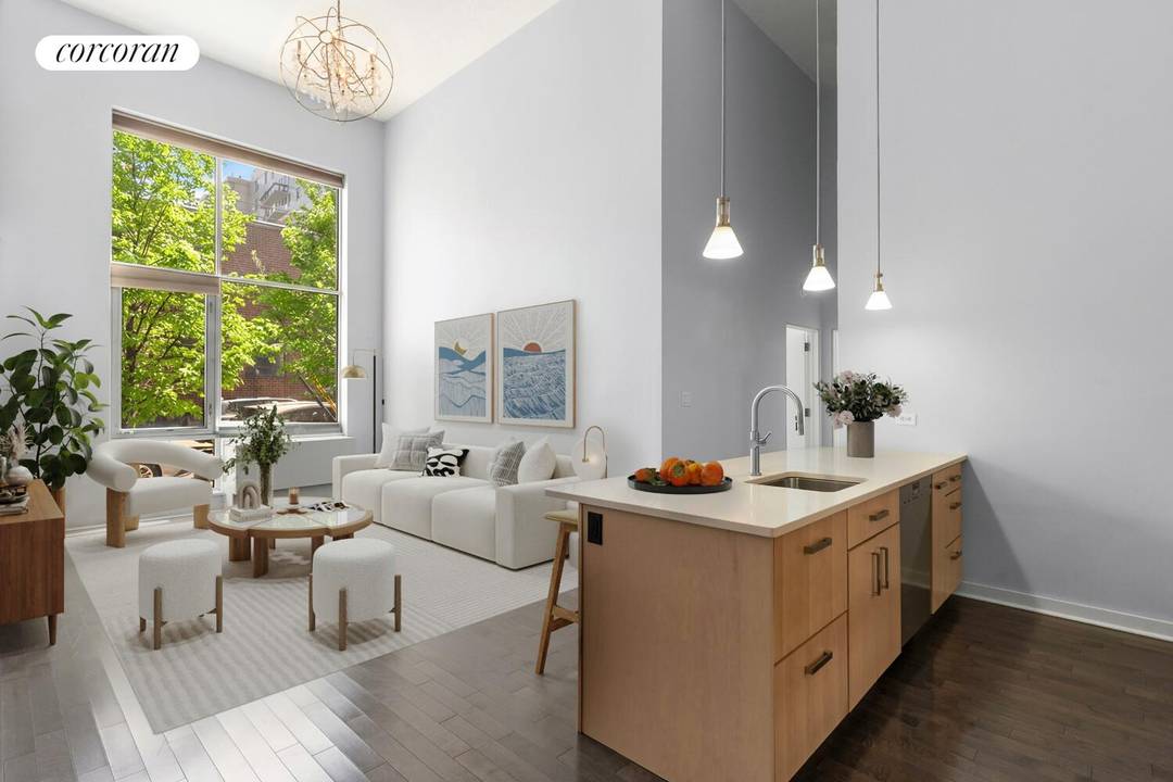Residence 1H at The Foundry Condominium 2 40 51st Avenue is a standout two bedroom, two bathroom home with dramatic 16'6 ceilings that create an immediate sense of scale, light, ...