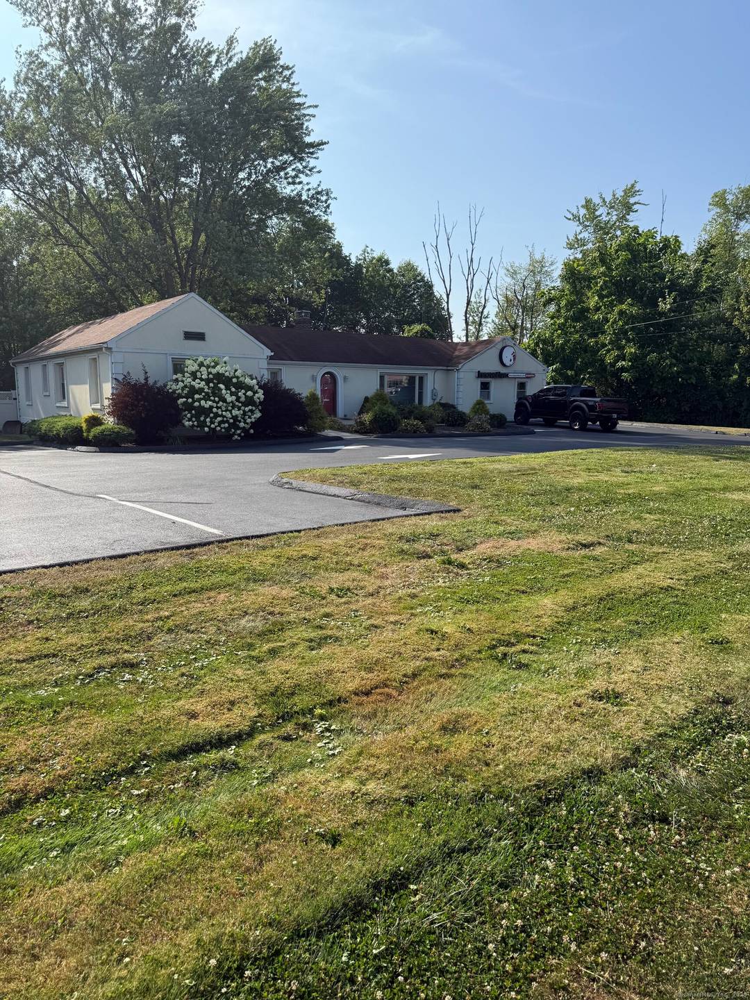 Located along the highly visible Newfield Street corridor, 609 Newfield Street is a converted mid century ranch now used as professional office space.