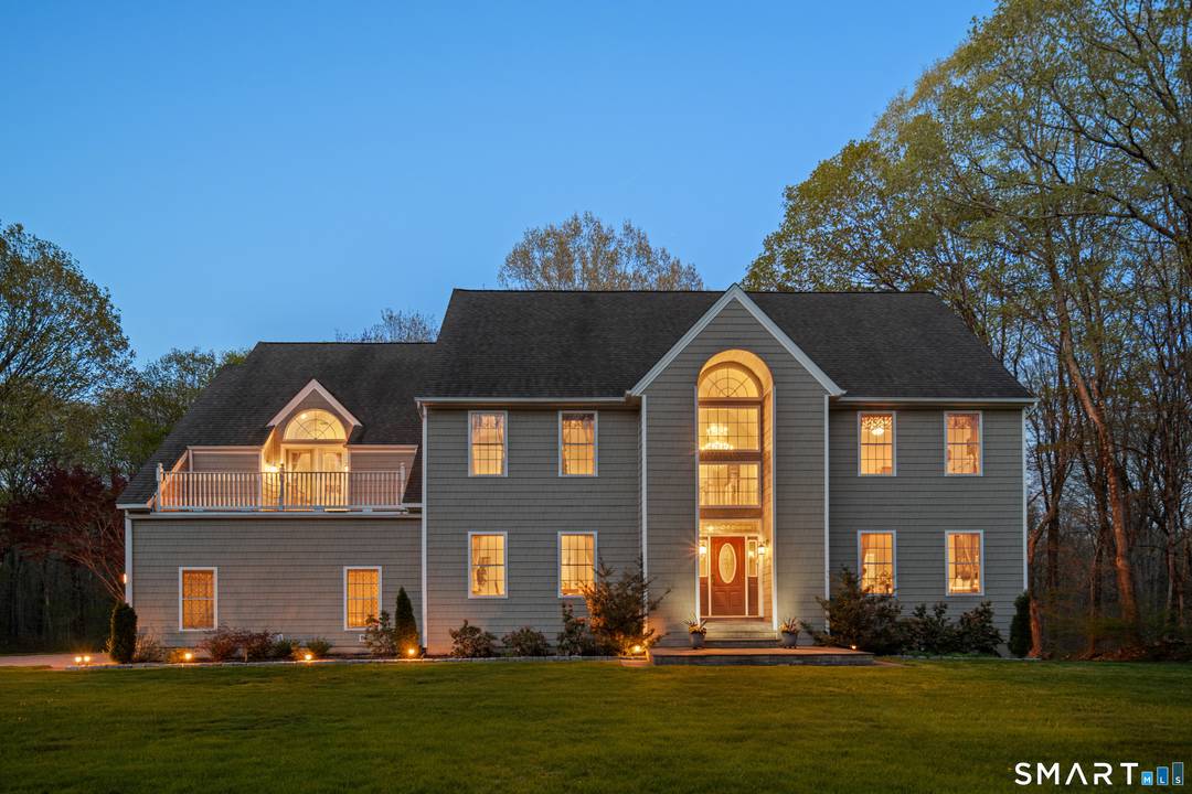 Privately positioned on nearly two acres in one of Madison's most desirable areas, this expansive Colonial offers a rare combination of privacy, scale, and convenience.