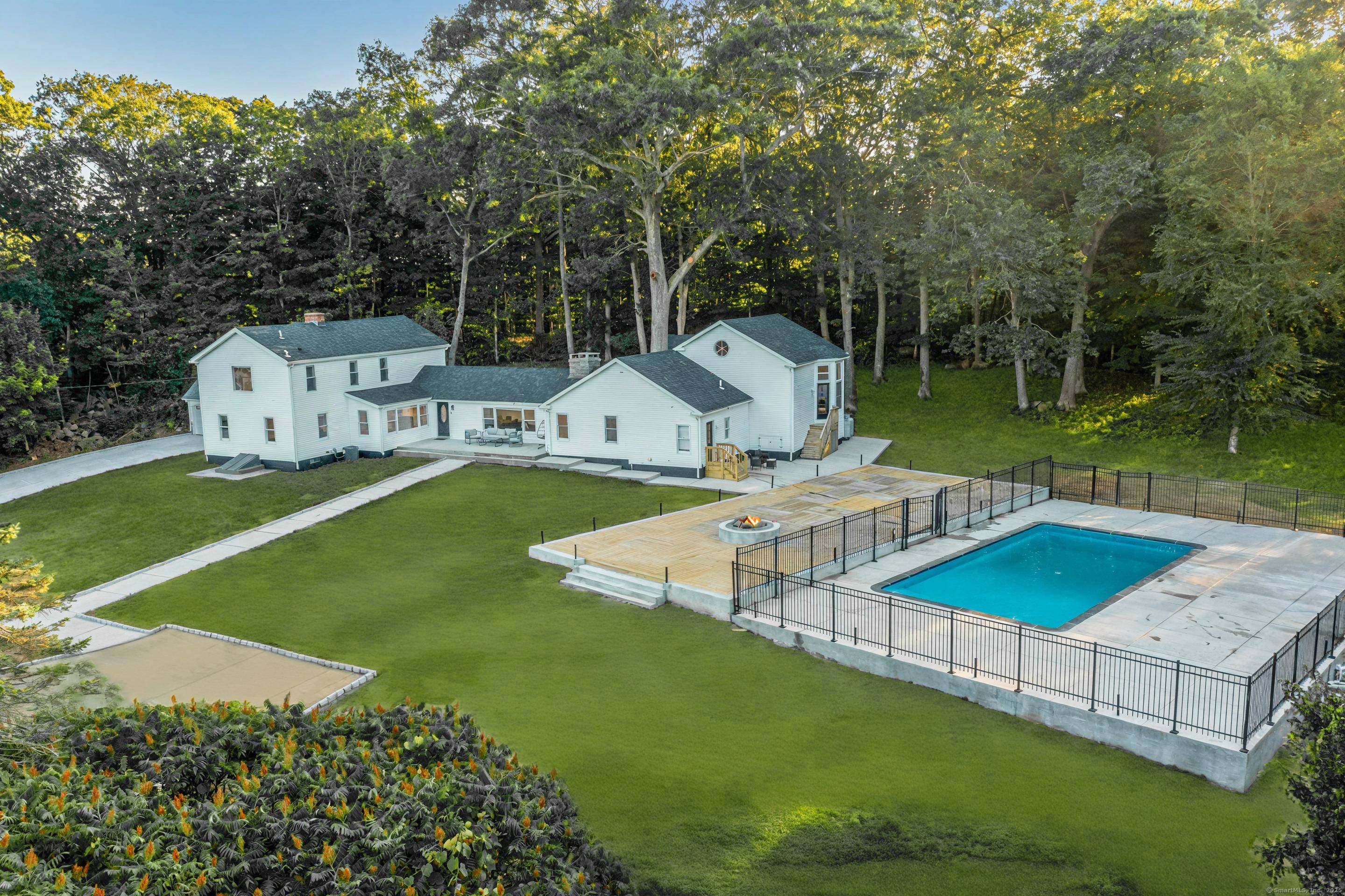 This fully renovated and expanded Farmhouse Colonial offers nearly 4, 000 sq ft of luxurious living space on a private 1.