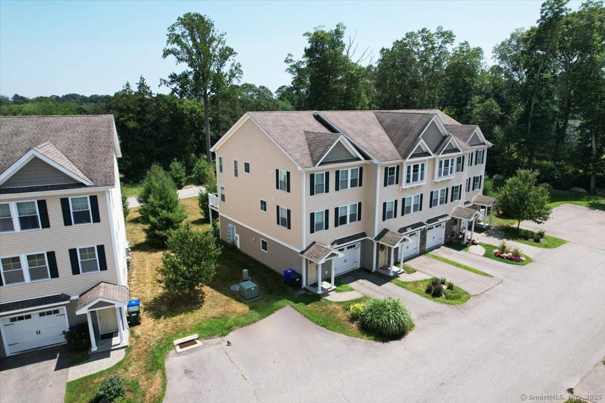 Step inside to find a sun filled open layout featuring gleaming hardwood floors, spacious living and dining areas, and a bright, updated kitchen with granite countertops and stainless steel appliances ...