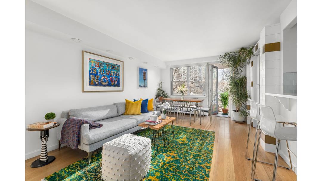 With great attention to detail, this sun filled custom built and mint north east corner converted three bedroom one bathroom home resides at Lincoln Guild, a full service mid century ...