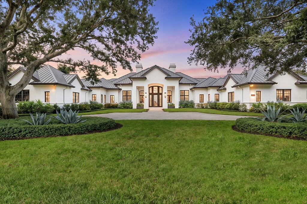 A private sanctuary in Palm Beach Gardens, 13001 Brynwood Palm captures the very essence of refined living.