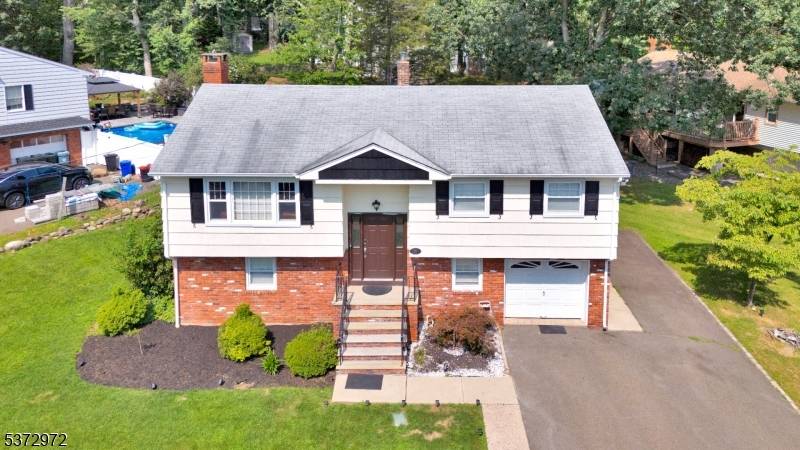 Discover the perfect blend of style, space, and location in this stunningly renovated 4 bedroom, 1.