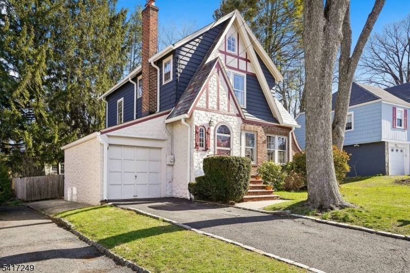 Welcome to one of Maplewood's most charming addresses.