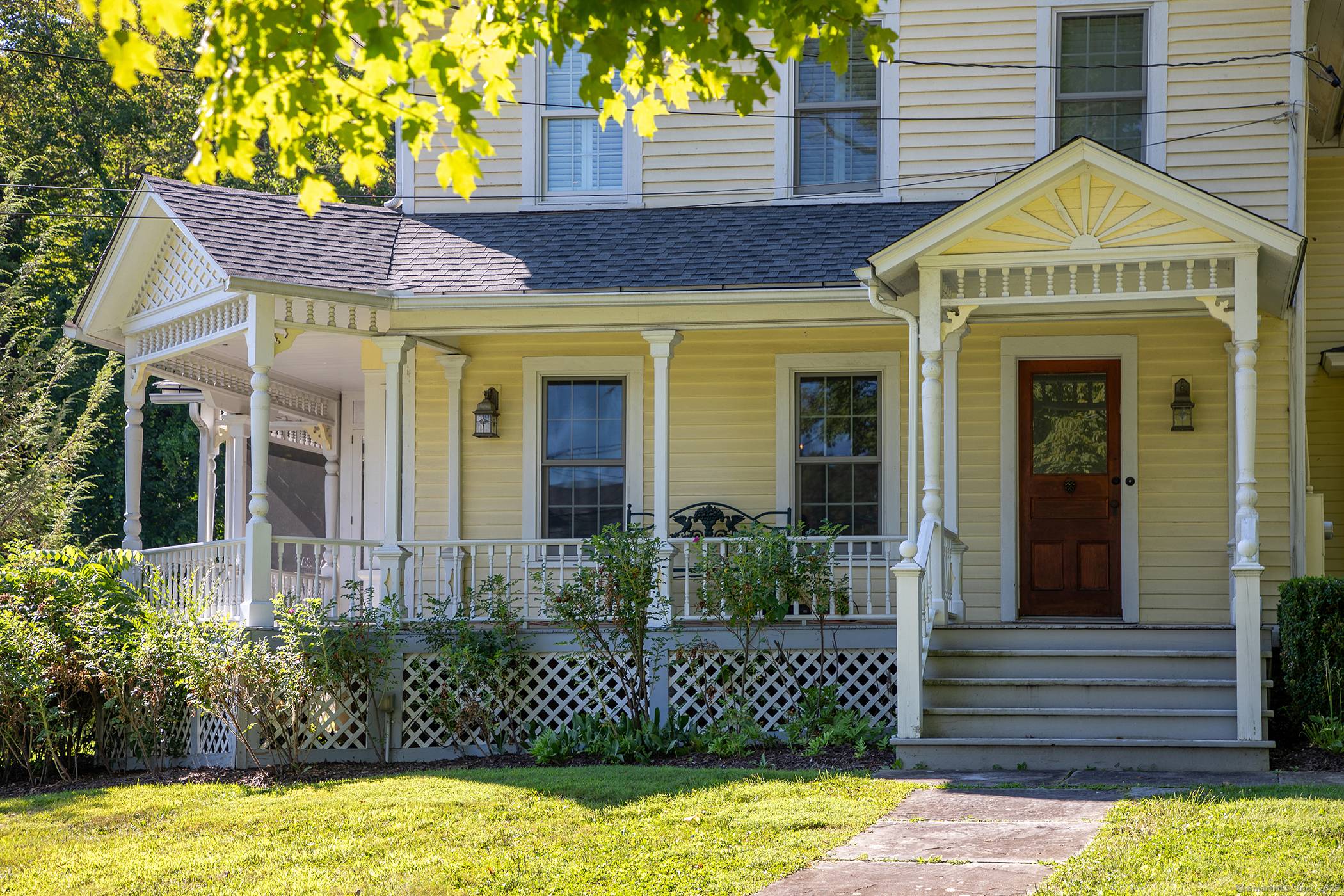 This beautiful Queen Anne Victorian sits prominently above the village of Lakeville on just over an acre.