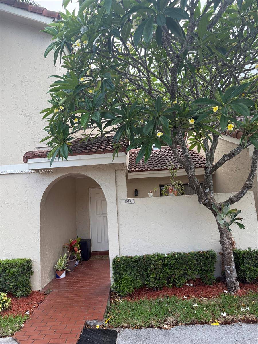 Three bedroom two bathroom townhome located in The Moors Community Miami Lakes Florida.