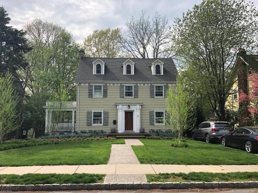 Step into timeless elegance with this beautifully maintained center hall Colonial.