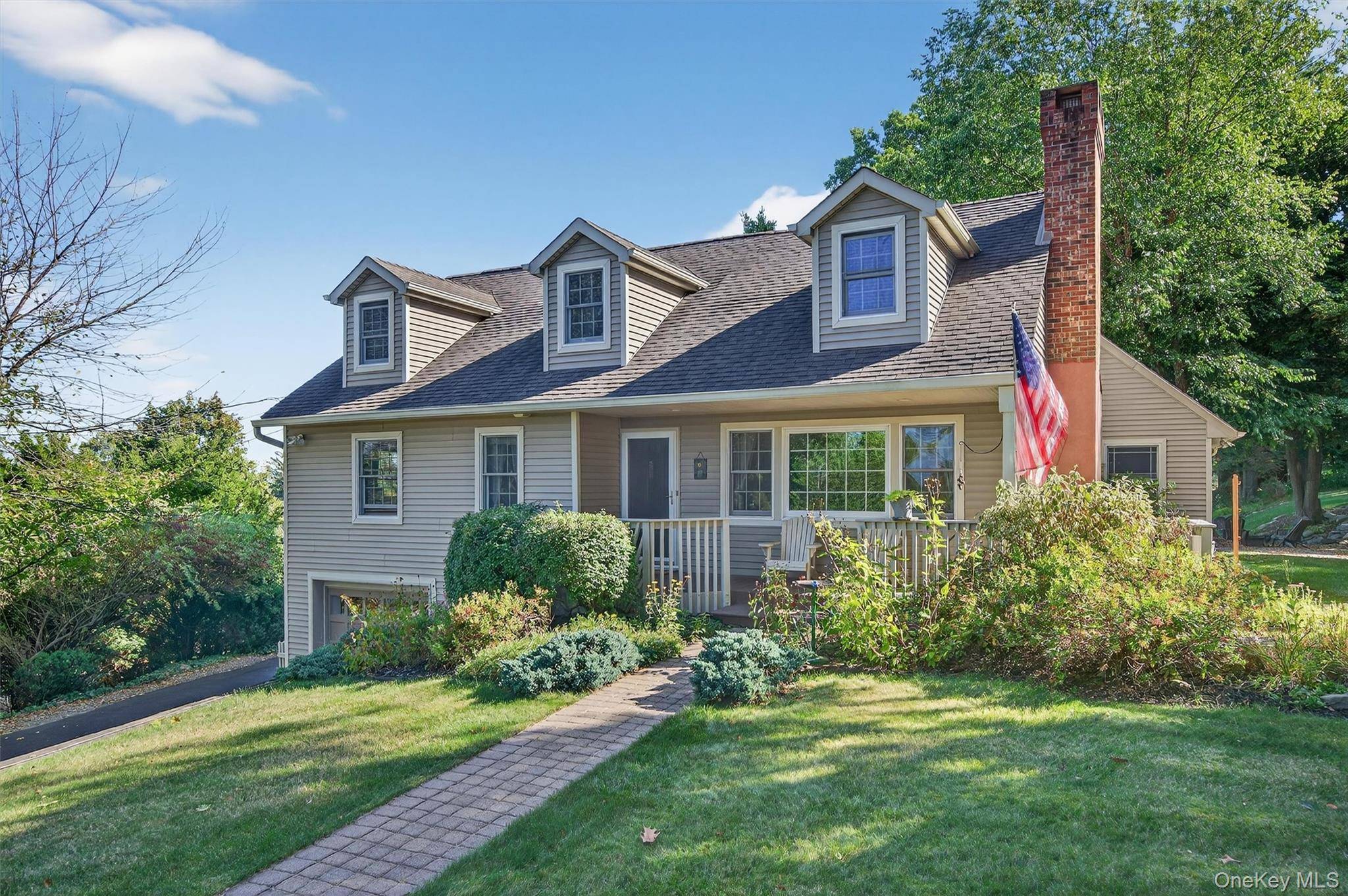 Welcome to your charming Cape Cod retreat in the heart of the Village of Warwick.