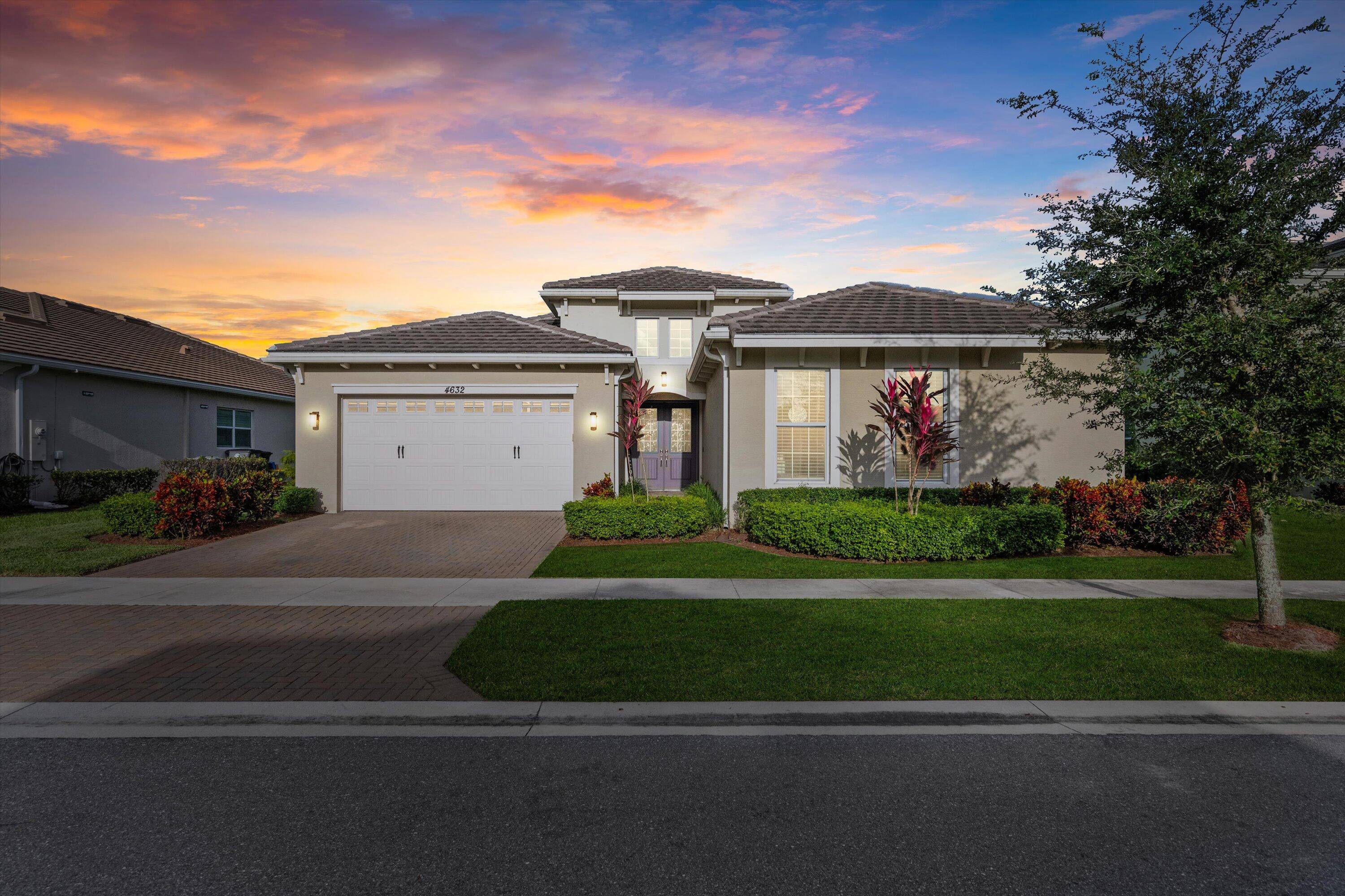 Welcome to the exquisite Kingfisher Grand model nestled in the sought after Groves community of Westlake, FL, offering unparalleled elegance and family friendly design.