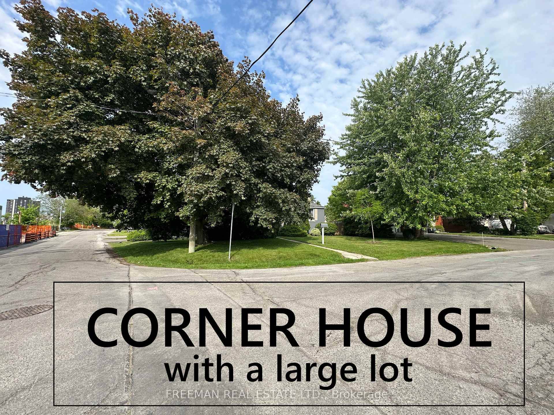 Huge sunny S E facing corner lot with detached garage and double driveway.