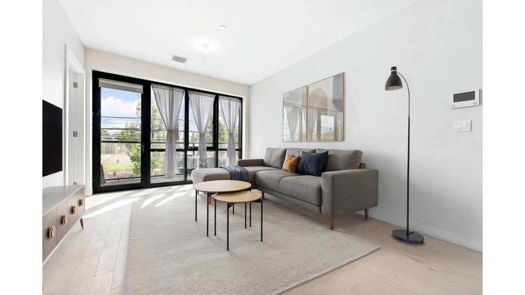 Welcome to this SECOND FLOOR 2BR 2BTH with Balcony in the heart of Red Hook.