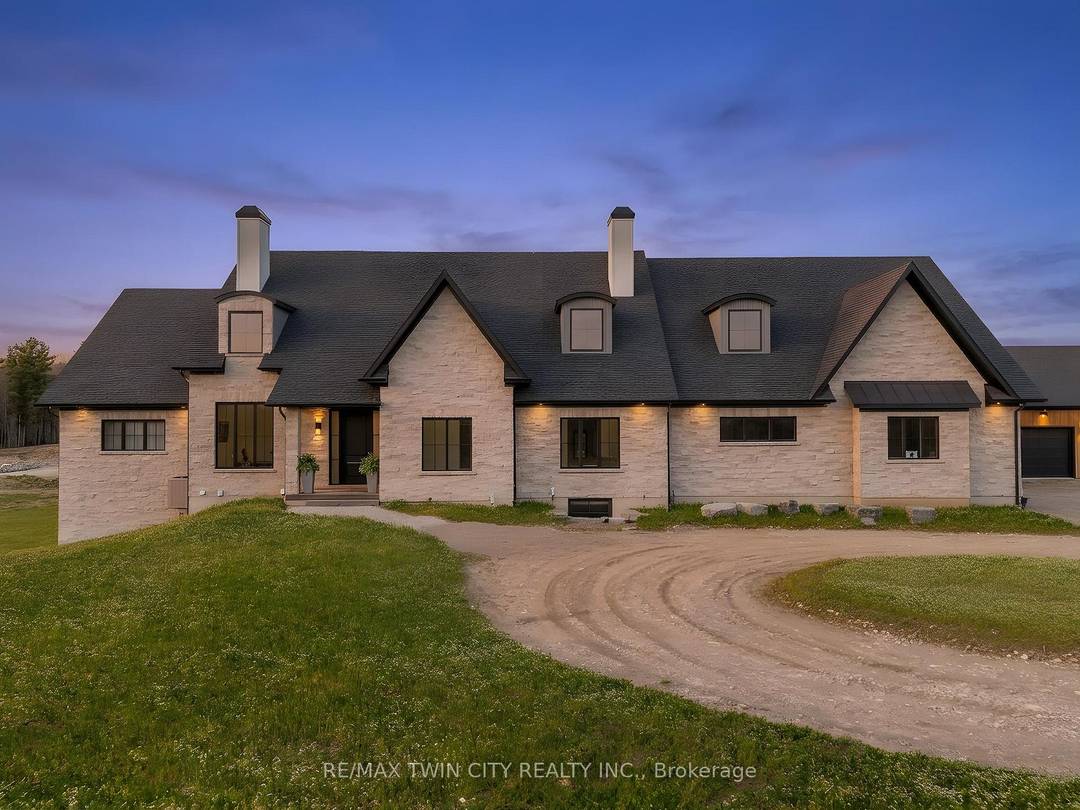 French Cha teau inspired country estate set on 22 private acres, offering nearly 8, 400 sq.