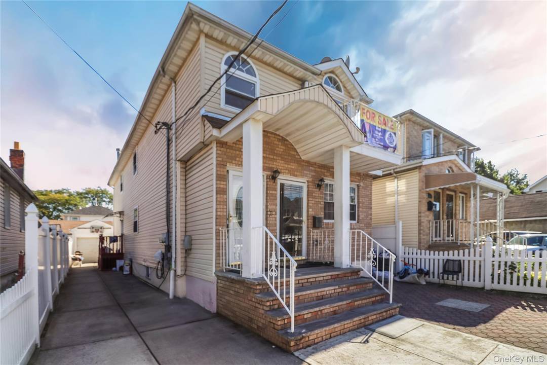 Income Generating Two Family Home in Prime Ozone Park Location !