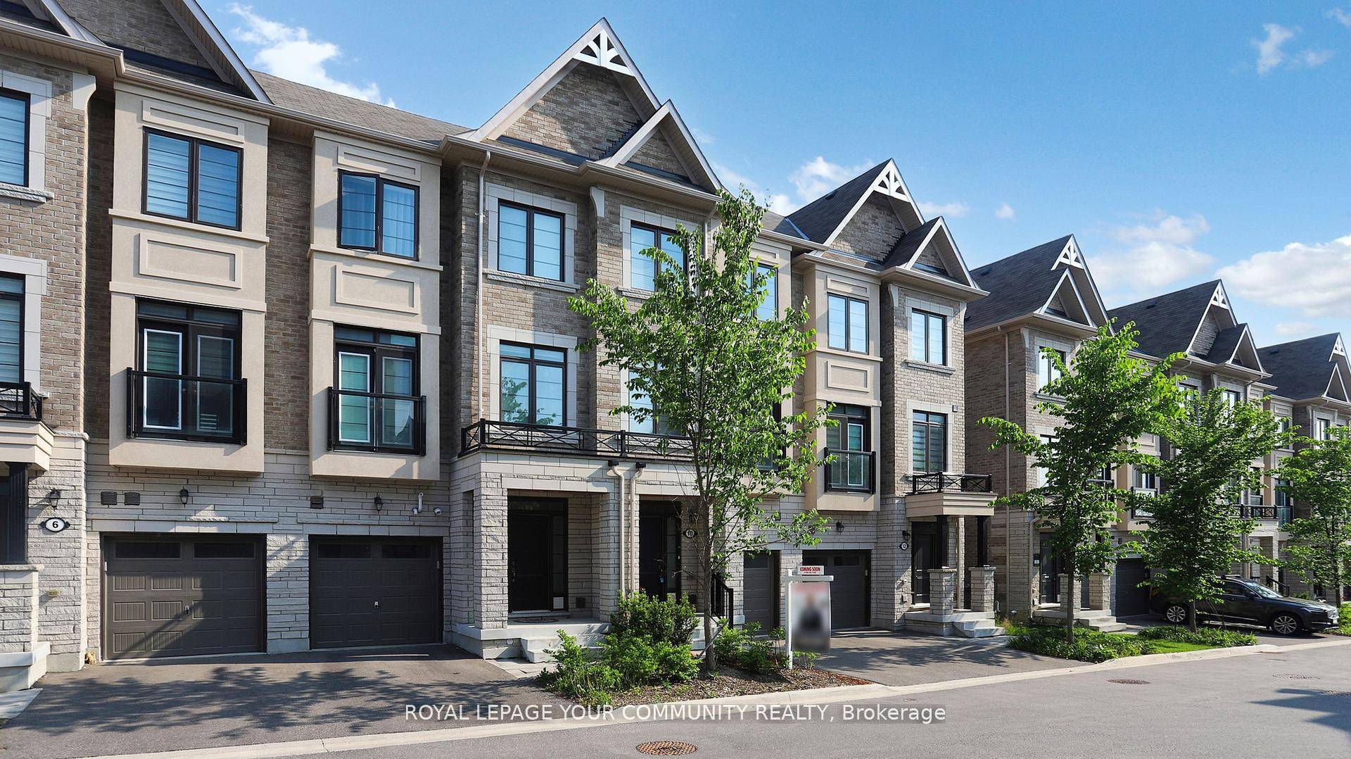 Elegant, Sun Filled Townhome in Prestigious Rouge Woods !