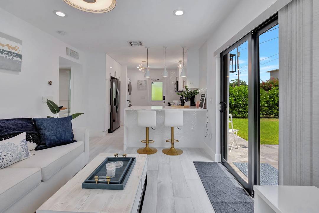 Enjoy coastal living in this beautifully renovated Sea Zen Cottage in East Delray's Osceola Park.