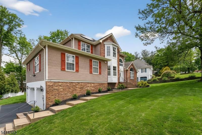 Welcome to this classically modernized four bedroom, four bath Center Hall Colonial located in a premier neighborhood of Rockaway Township.