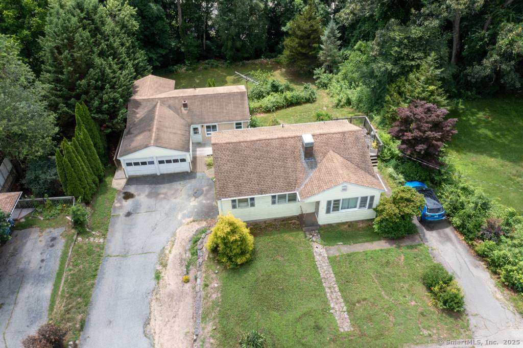 Never Before Listed as a Multi Family Property This unique property features two separate ranch style homes, situated on a quiet, dead end street.