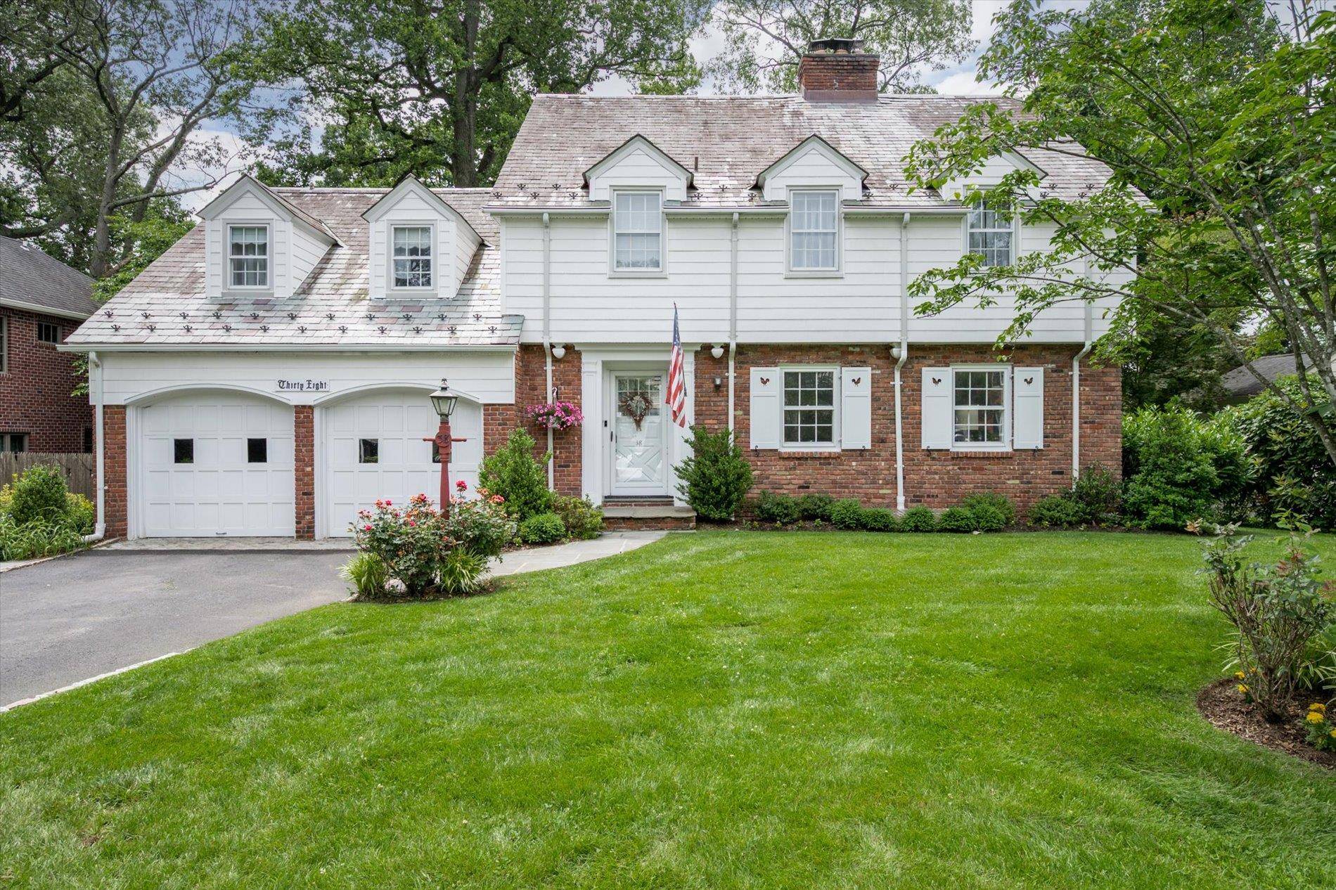 This classic colonial is located on a picturesque street in the village of Flower Hill, and has been meticulously maintained and updated throughout the years.