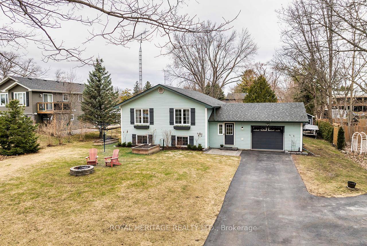 Located on a Picturesque Tree Lined street you'll find this impeccably maintained Raised Bungalow offering 2 2 Bedrooms and 2.