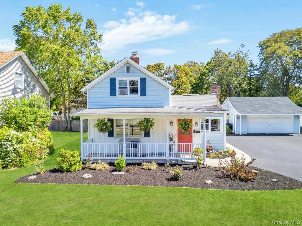 Step into the timeless elegance of 181 Blue Point Avenue a lovingly maintained residence in the heart of Blue Point that beautifully blends historic charm with today's modern updates.