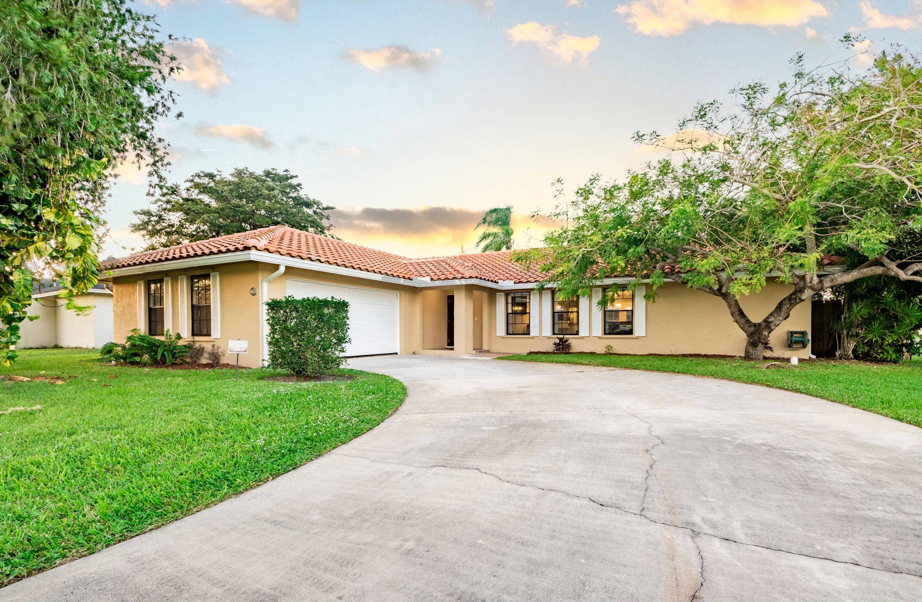 This stunning 4BR 2BA fully renovated home sits on a corner lot in a highly desirable community without HOA restrictions.