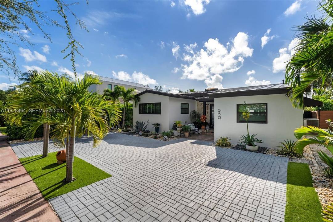 A perfect family home in Miami Beach s beautiful Lakeview neighborhood !