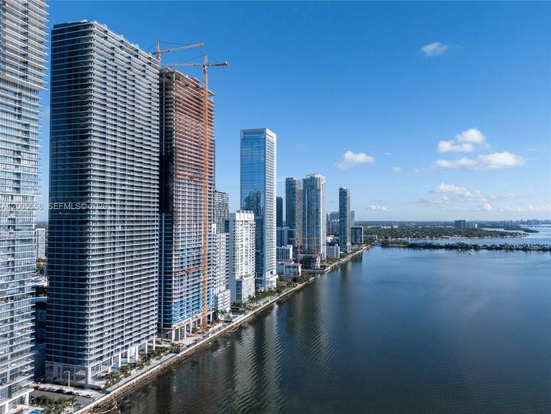 A rare Bay Level offering in Aria Reserve s coveted 02 A Special line, with expansive double wide 26' 9 x 31' 4 living and dining spaces for elevated entertaining.