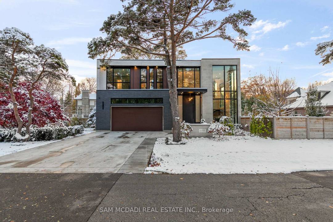 Welcome to this resplendent custom built masterpiece in Southeast Oakville, where flawless contemporary design meets the serenity of lakeside living.