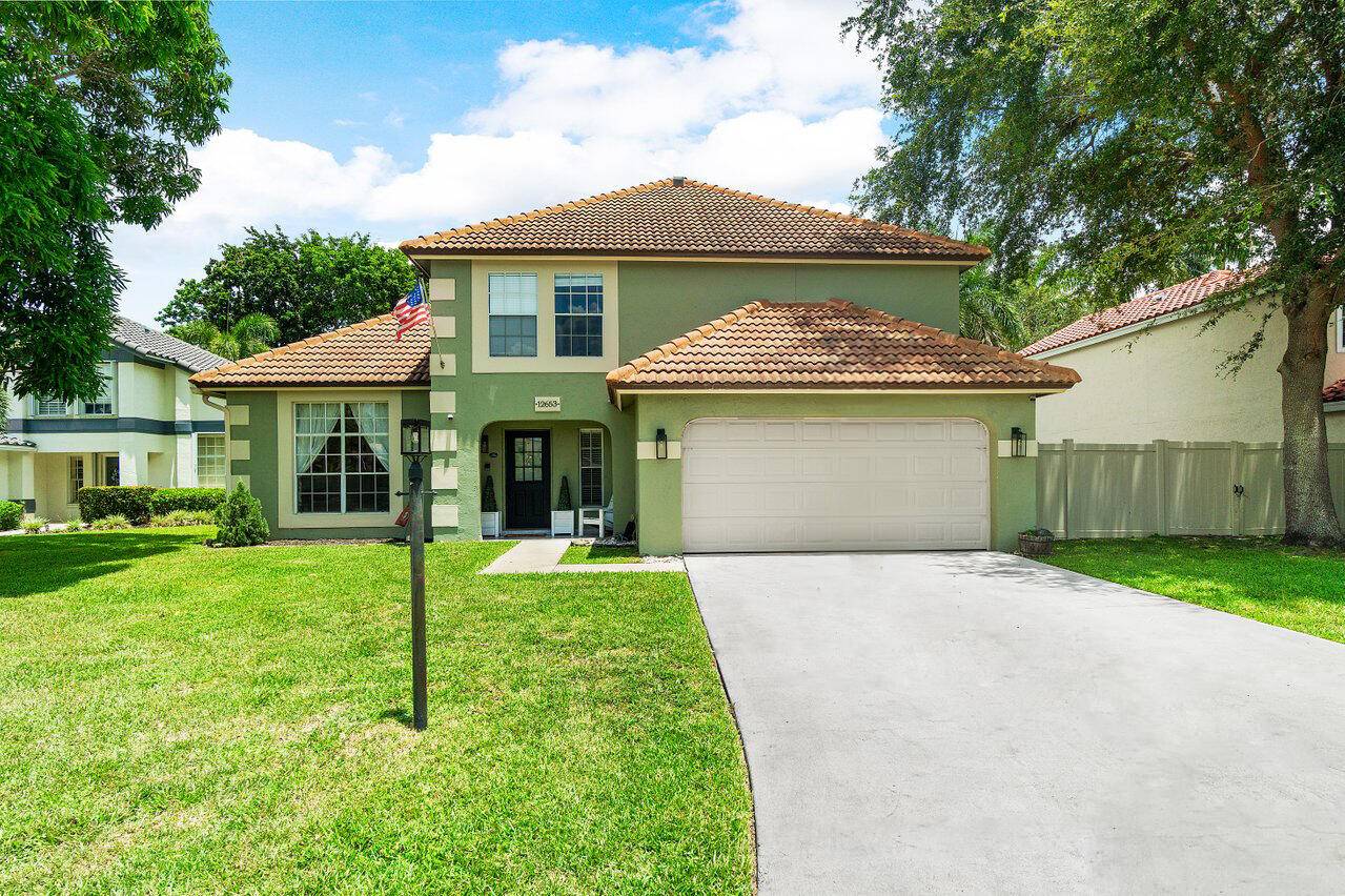 Desirable 2 story, CBS home w access to Lake Wellington in the charming Lake Point community.