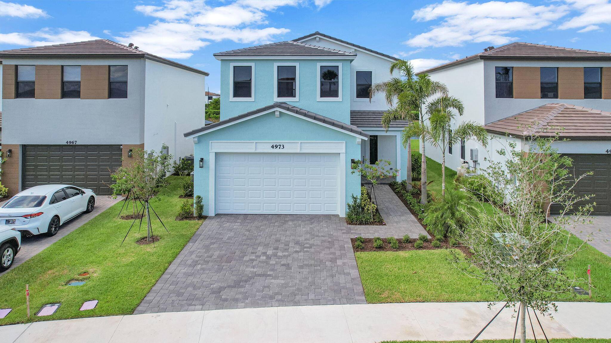 Welcome Home to this stunning and highly desirable waterfront Sand Dollar 5 pool home, a prestigious Builder's Model in the sought after Sky Cove enclave of Westlake !