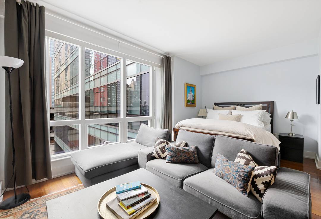 This spacious and sunlit alcove studio offers a perfect blend of city living and comfort, located in the heart of Midtown West.