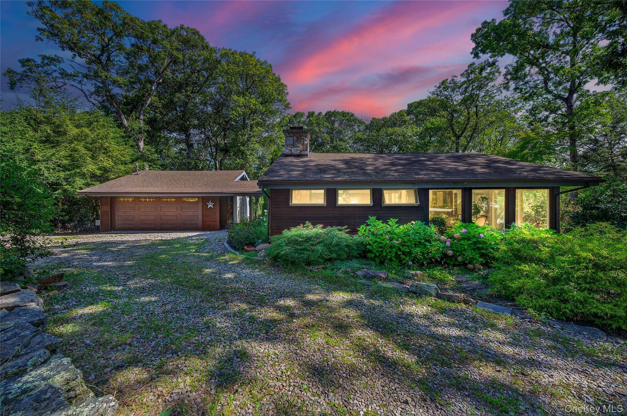 Stunning midcentury modern contemporary home in Tuxedo s sought after Laurel Ridge community.