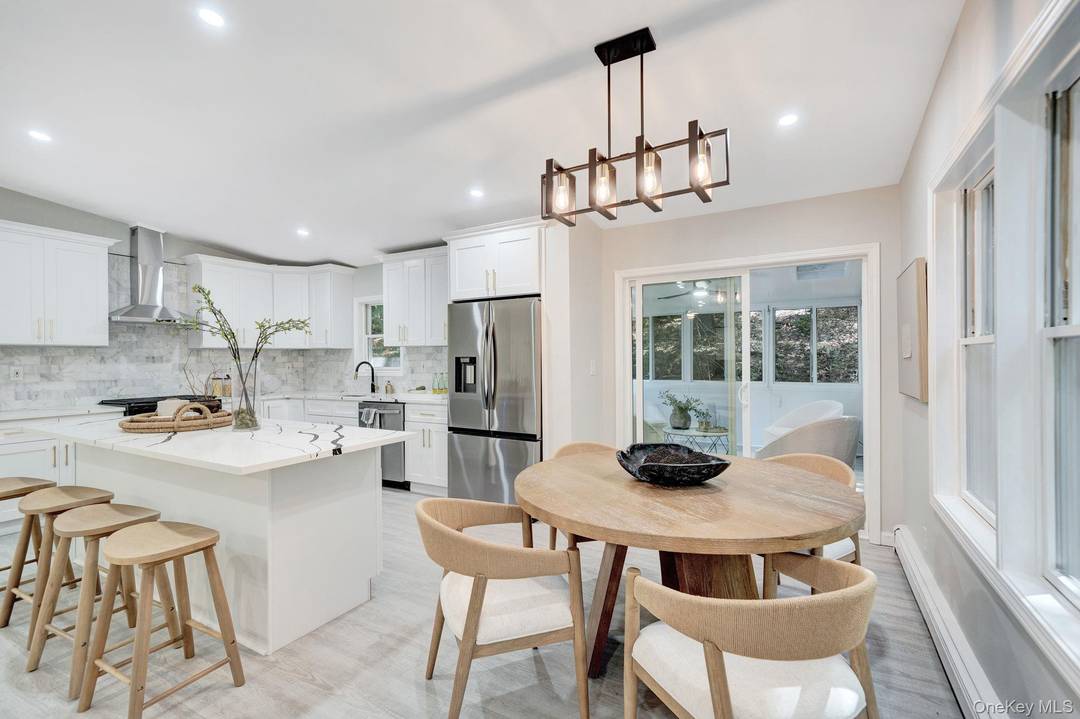 Beautifully remodeled 4 bedroom, 4 bath colonial in Northport featuring modern finishes throughout.