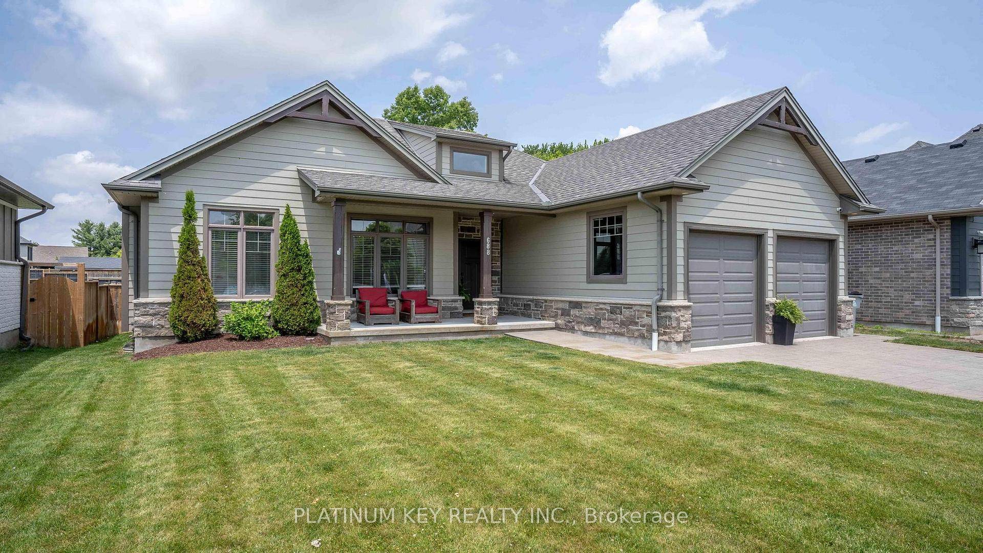 A stunning bungalow in the highly sought after Woods Edge subdivision of Mount Brydges, where small town charm meets modern living.
