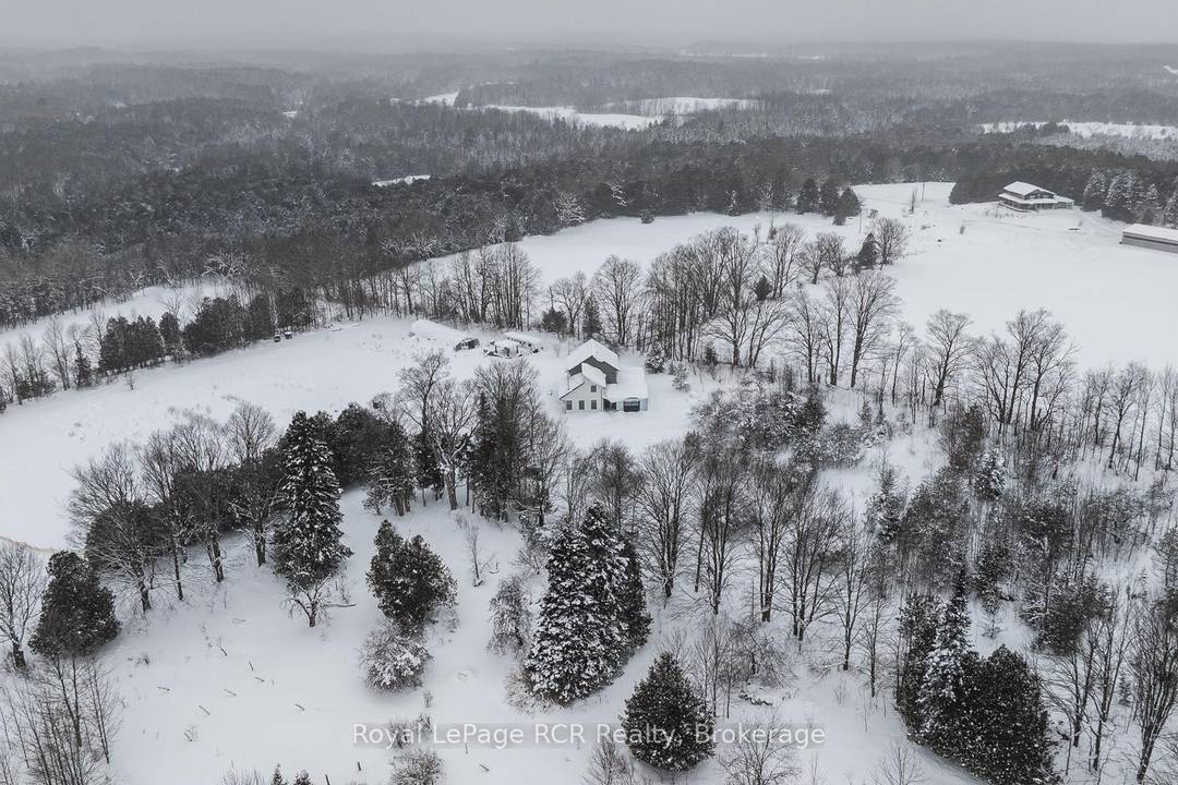 Custom built 2015 architect designed home with accessory apartment set on 151 picturesque acres.