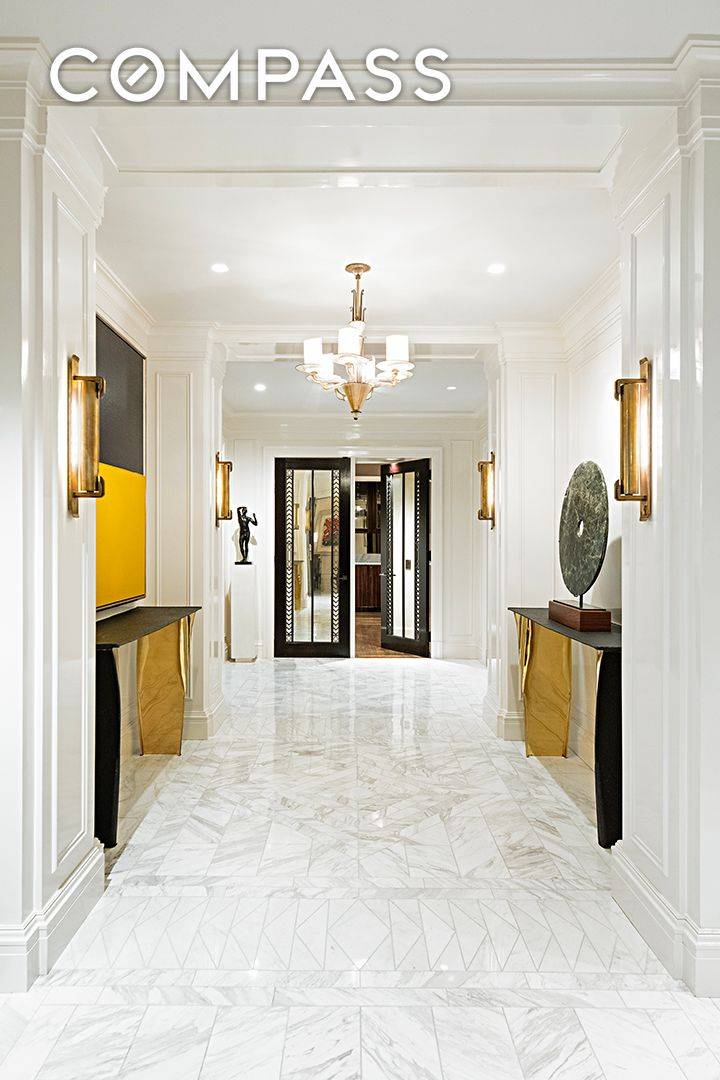 Ideally located on East 71st Street and situated in one of Park Avenue s most prestigious and sought after pre war cooperatives, this triple mint high floor duplex residence is ...