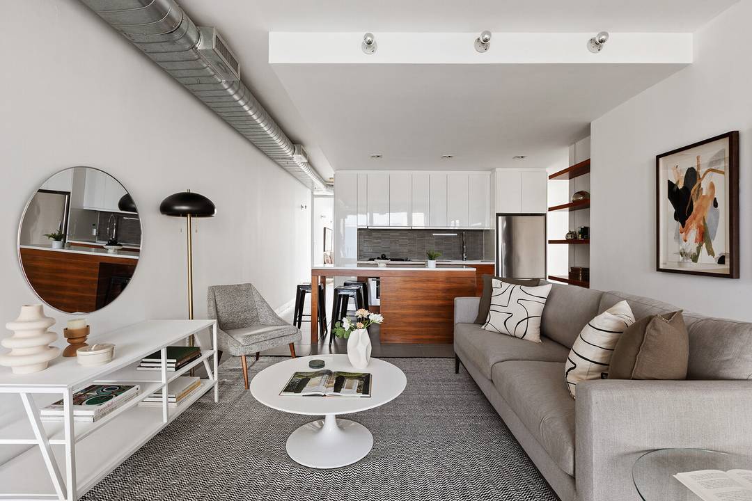 Discover chic modern living in this sun splashed two bedroom, one bathroom condominium featuring pristine contemporary interiors, private outdoor space, a deeded parking space, and a fantastic location where Prospect ...