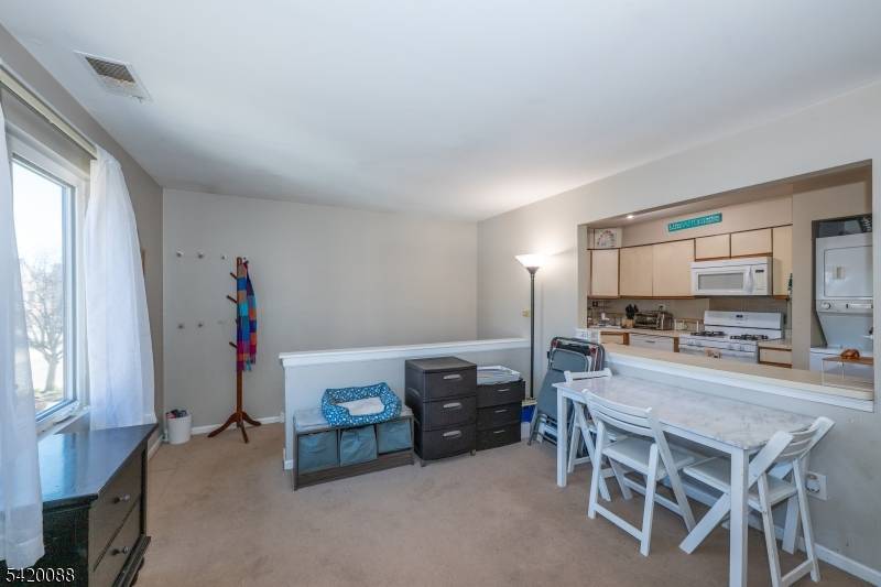 Located in the highly sought after Sunrise at Hanover community, this second floor 2 bedroom 2 bath end condo boasts an open floor plan comprised of the living room, dining ...