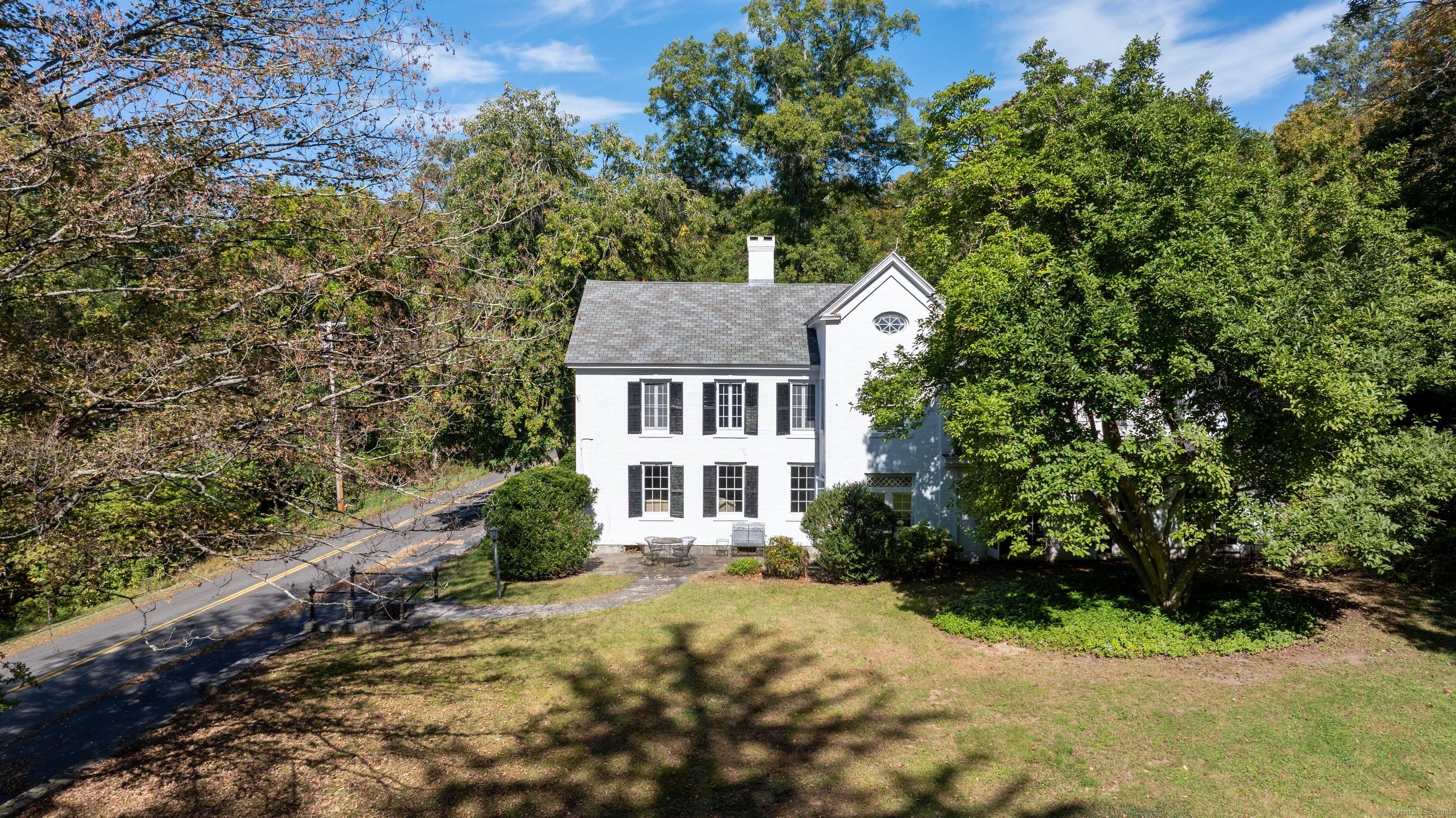 Step back in time with this stately 1829 Federal style residence, known as the Charles L.