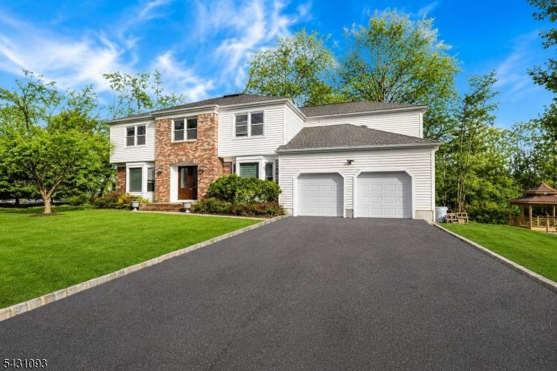 Welcome to this stunning center hall colonial, perfectly situated on a peaceful cul de sac in the heart of Florham Park.