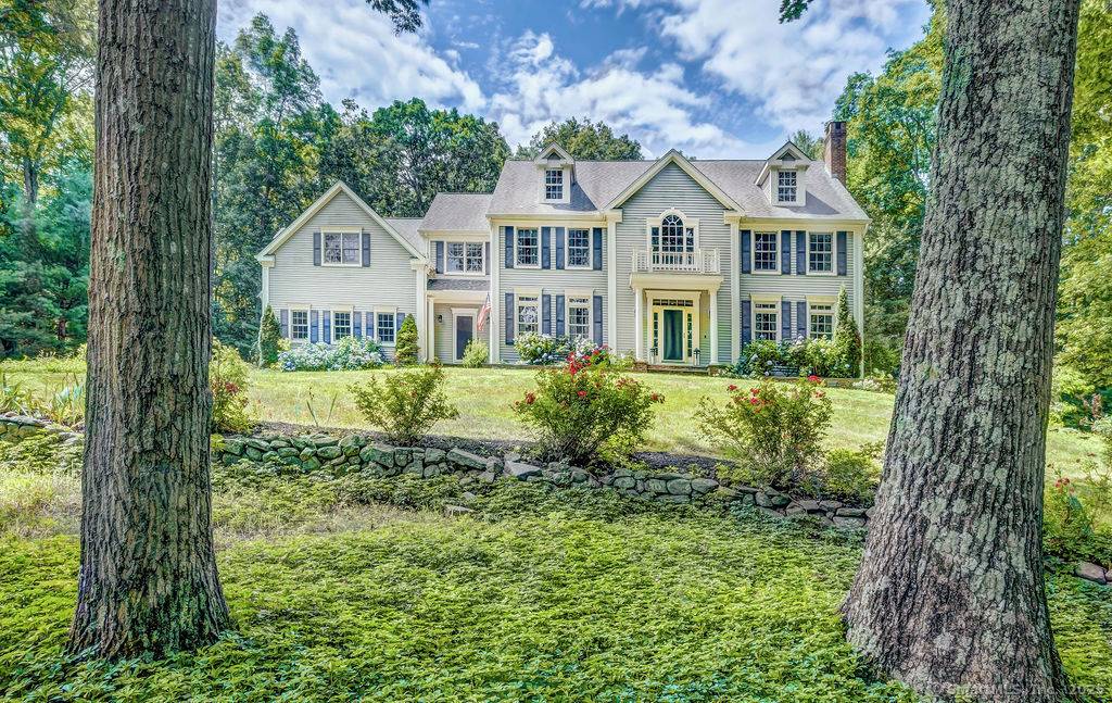 Perched above a quiet cul de sac, in one of Madison's most prestigious communities, this stately five bedroom Colonial is minutes from I 95 and Madison's Town Green and beaches.